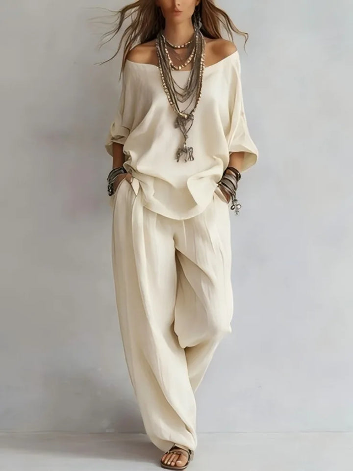 Vittoria - Completo in due pezzi con top off-shoulder e pantaloni a gamba larga