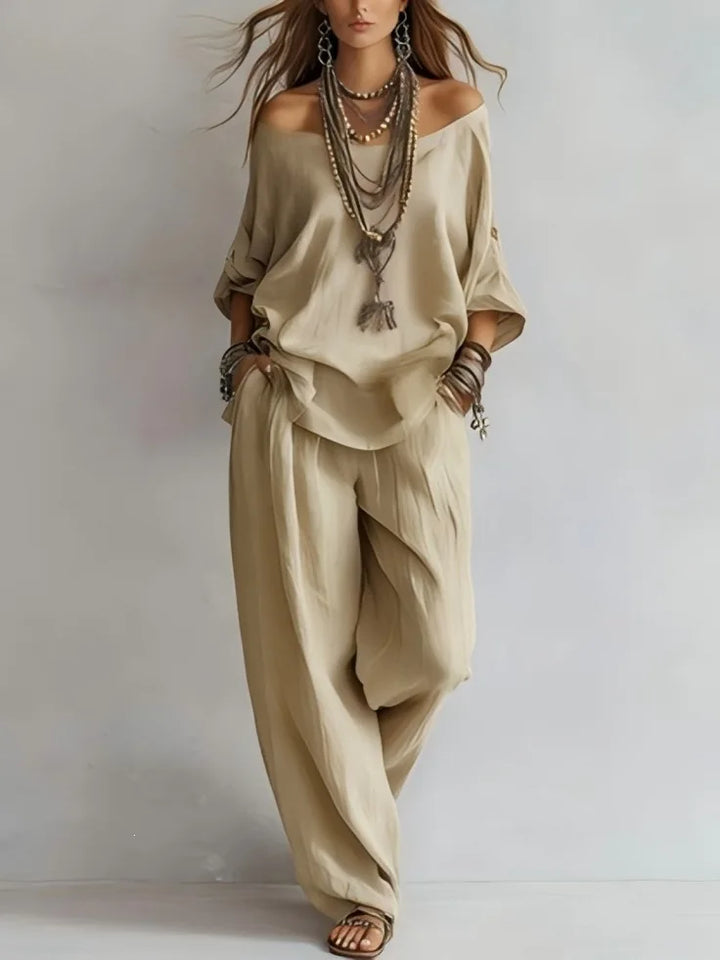 Vittoria - Completo in due pezzi con top off-shoulder e pantaloni a gamba larga
