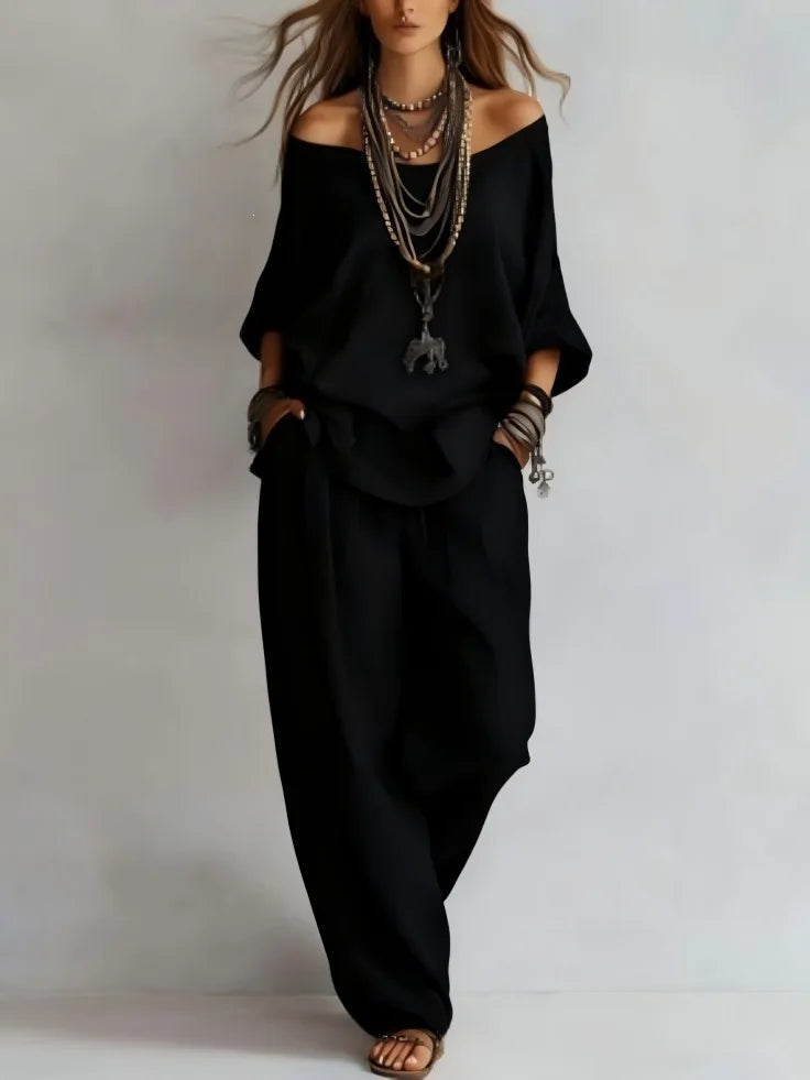 Vittoria - Completo in due pezzi con top off-shoulder e pantaloni a gamba larga