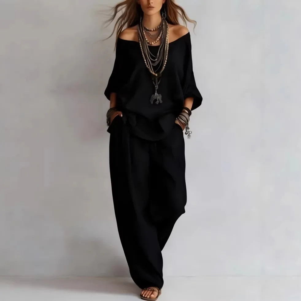 Vittoria - Completo in due pezzi con top off-shoulder e pantaloni a gamba larga