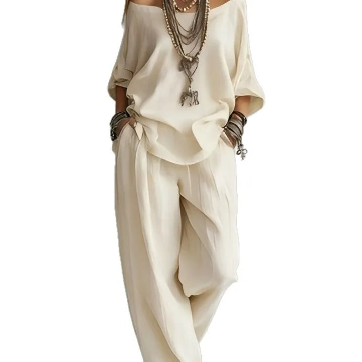 Vittoria - Completo in due pezzi con top off-shoulder e pantaloni a gamba larga