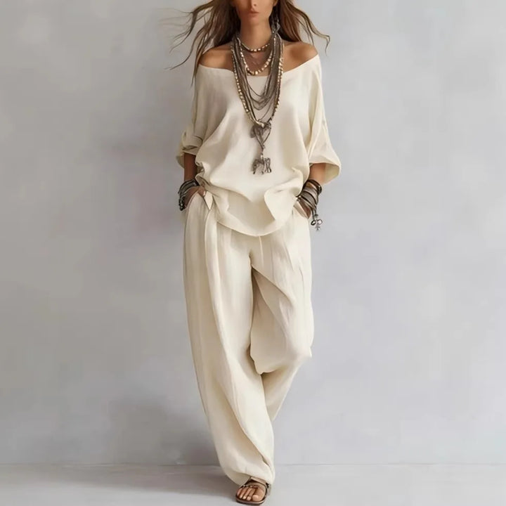 Vittoria - Completo in due pezzi con top off-shoulder e pantaloni a gamba larga