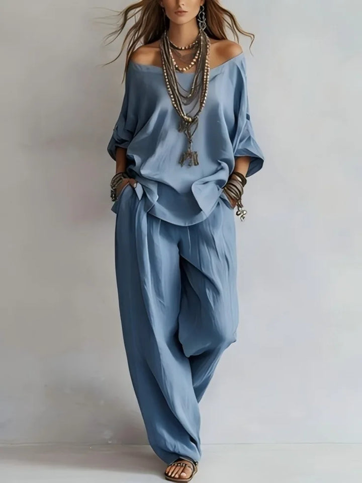 Vittoria - Completo in due pezzi con top off-shoulder e pantaloni a gamba larga
