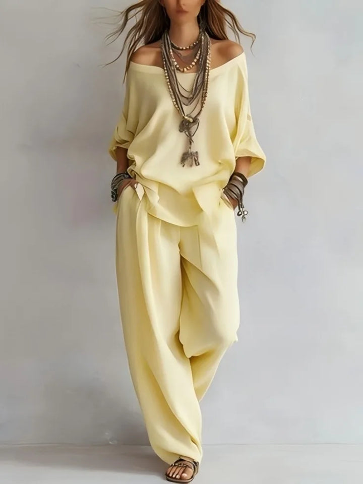 Vittoria - Completo in due pezzi con top off-shoulder e pantaloni a gamba larga