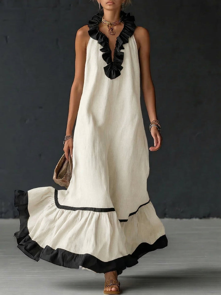 Vestito maxi elegante e romantico con volant e blocchi di colore